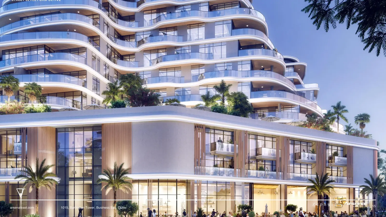 Curved balconies above the ground-floor retail podium