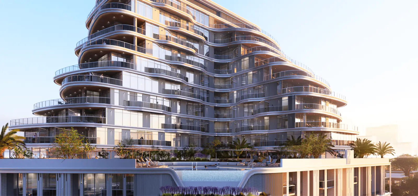 Curved balcony facade above the pool deck