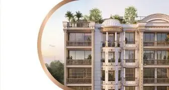 Facade with arched balconies and rooftop greenery