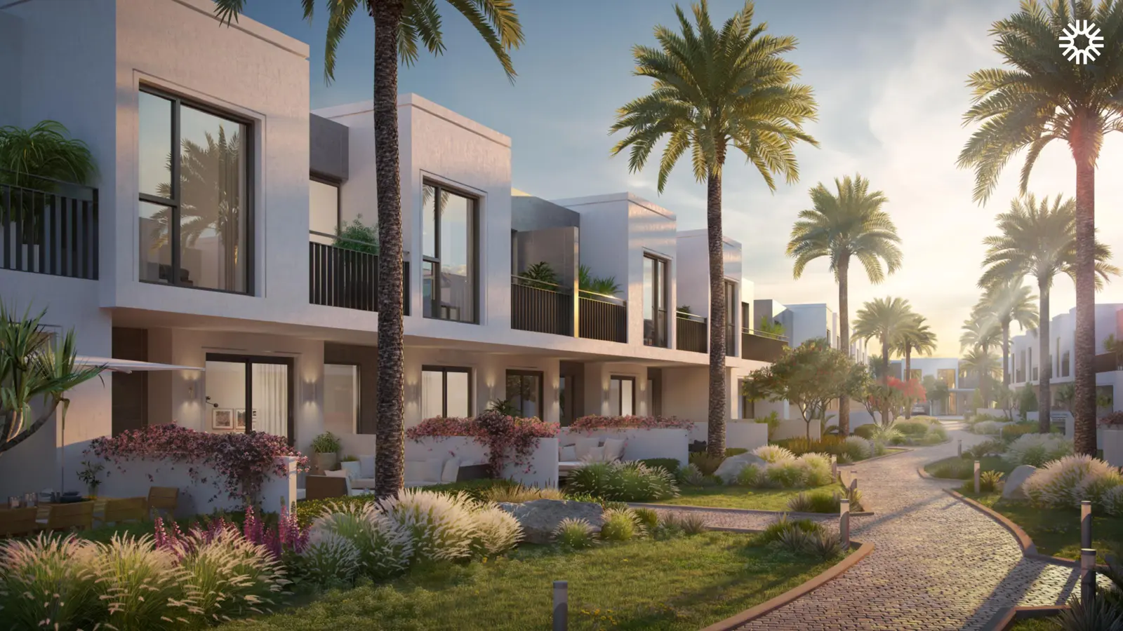 Villas along a landscaped path at sunset