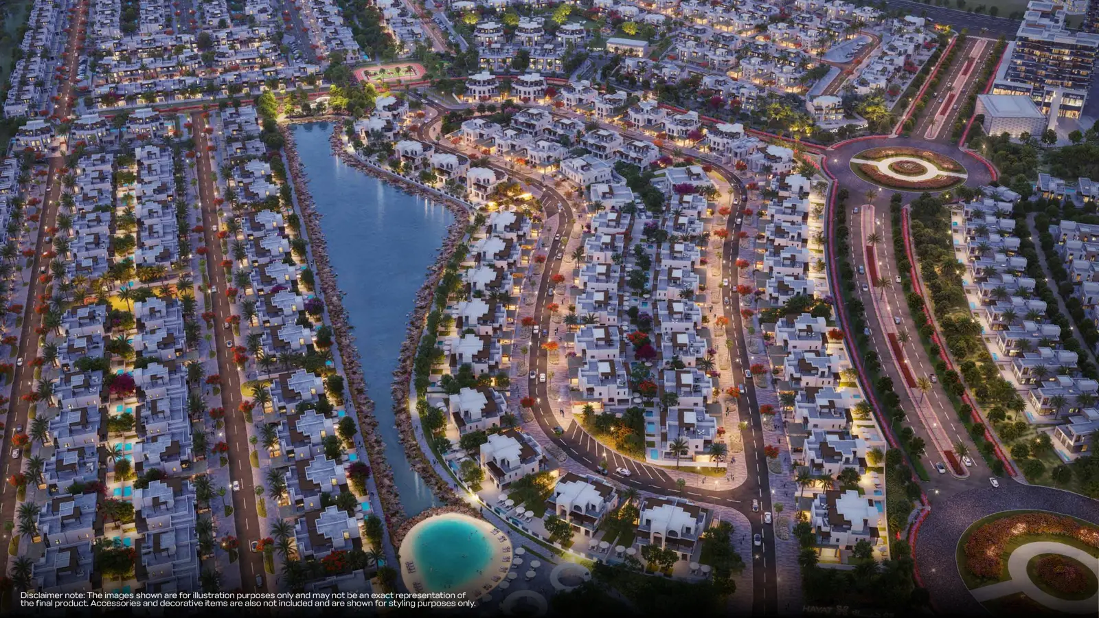 Night aerial of lake, townhouses and lagoon pool