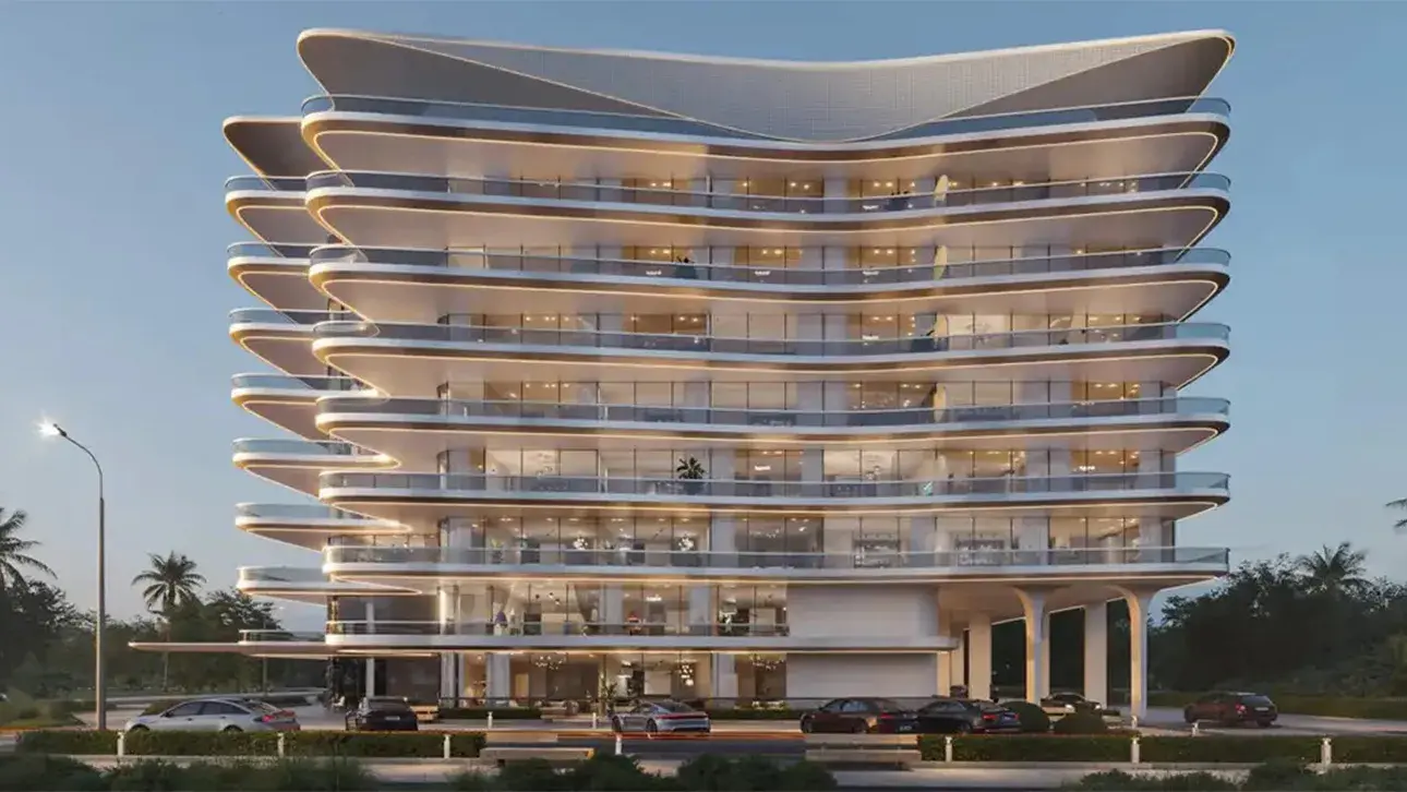 Curved terraced facade of the seven-storey building at dusk
