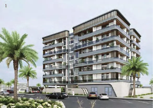Mid-rise residential building with balconies and palm trees