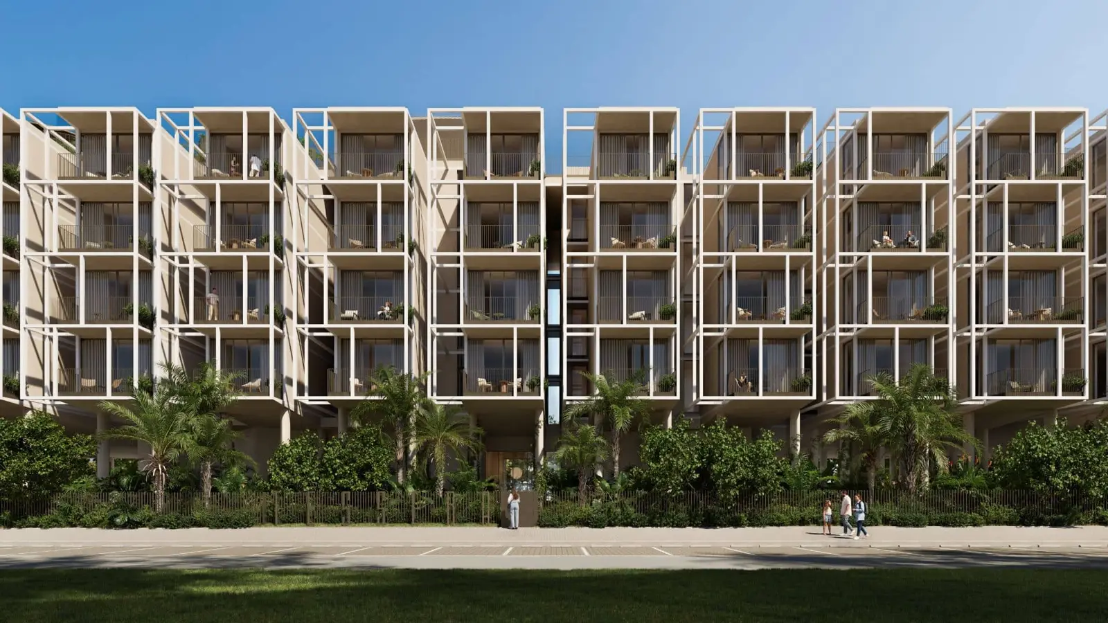 Facade with white frames and terraces behind palms