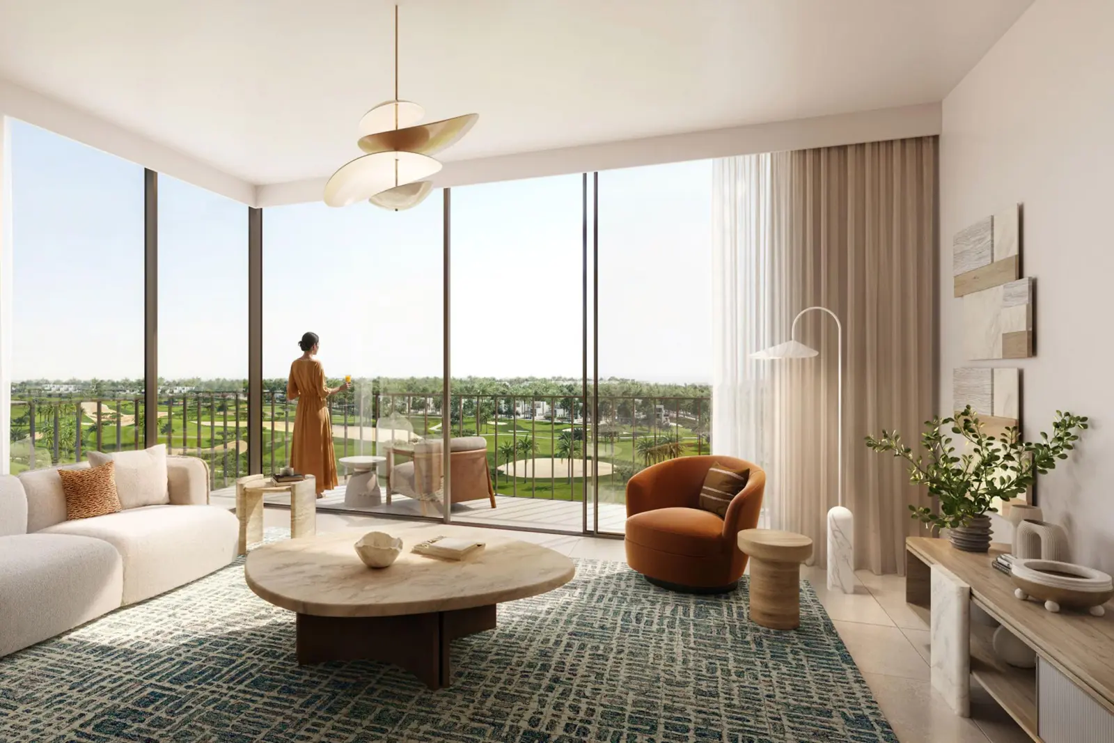 Living room opening to a golf view balcony