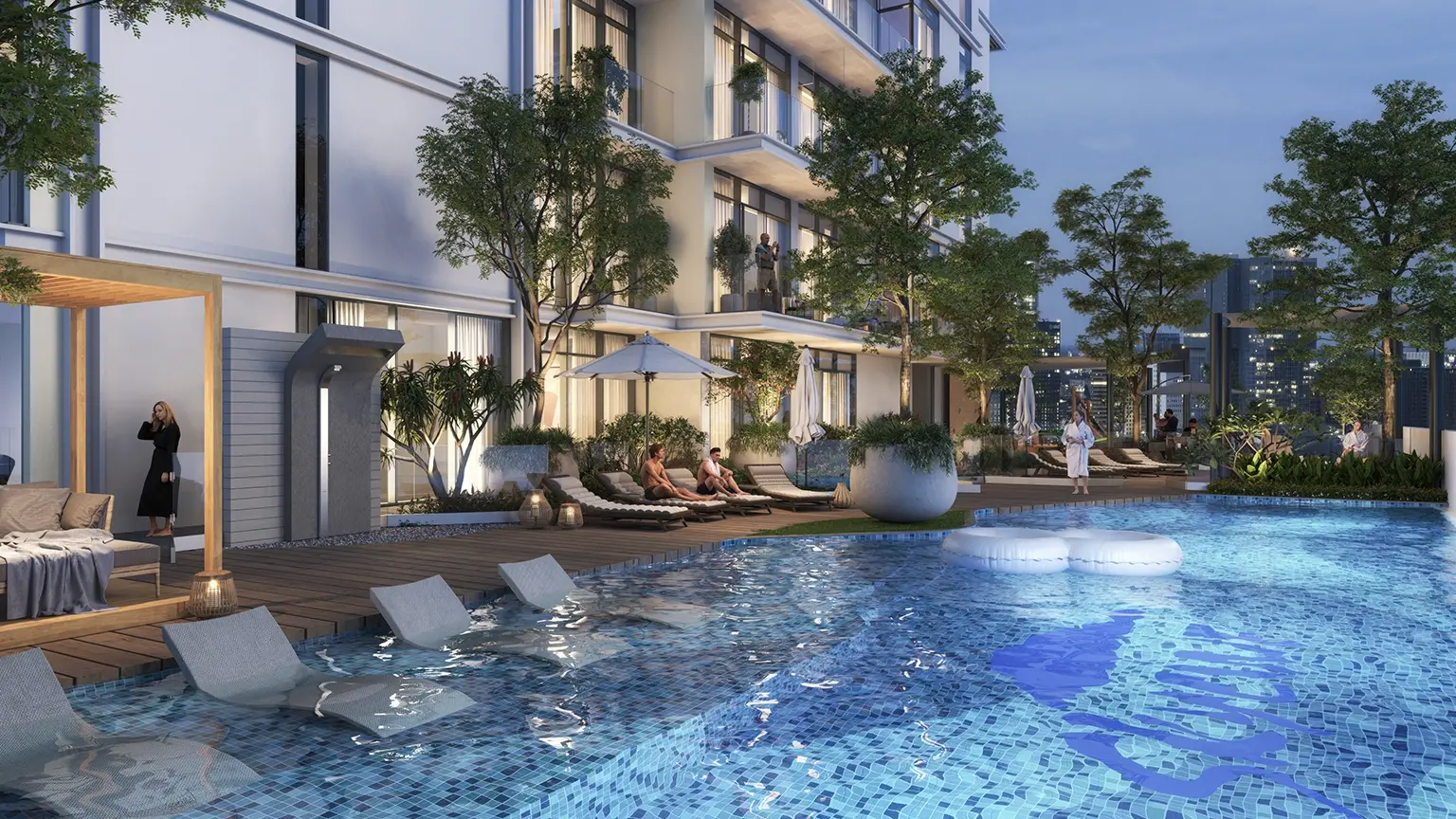 Pool with sunken seating at dusk