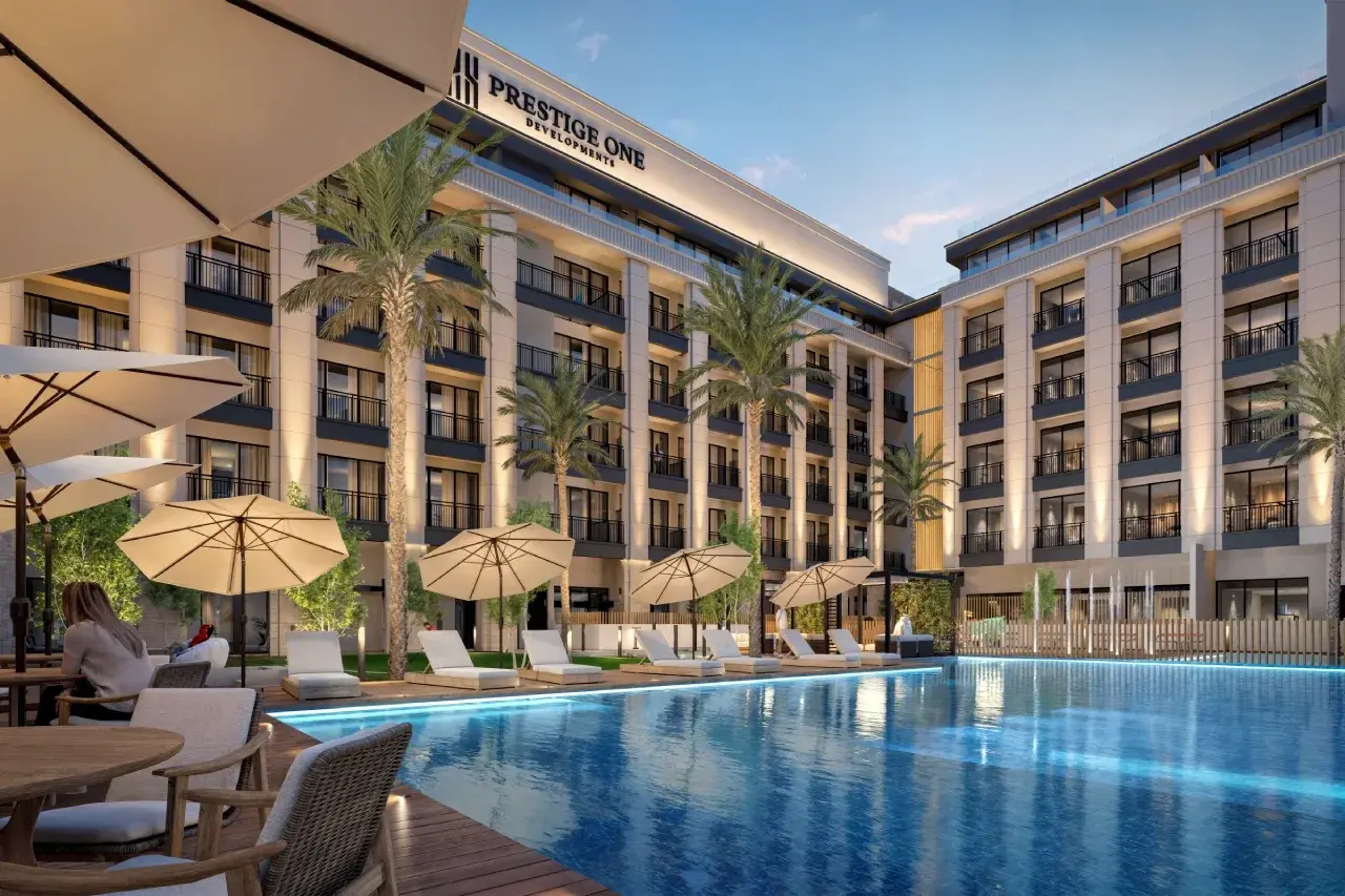 Pool deck with loungers and umbrellas