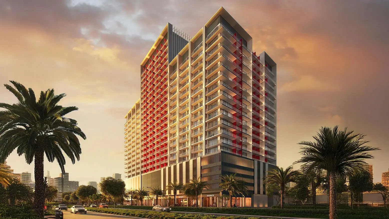 Tower with red facade accents at sunset