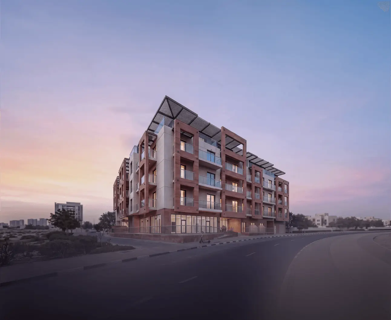 Building corner at dusk with pink sky
