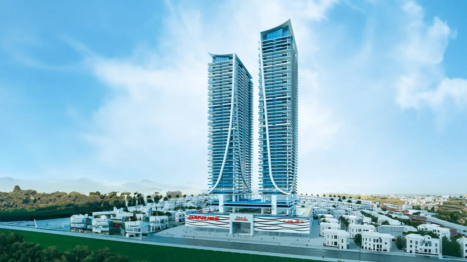Twin towers above a low-rise district, wide view