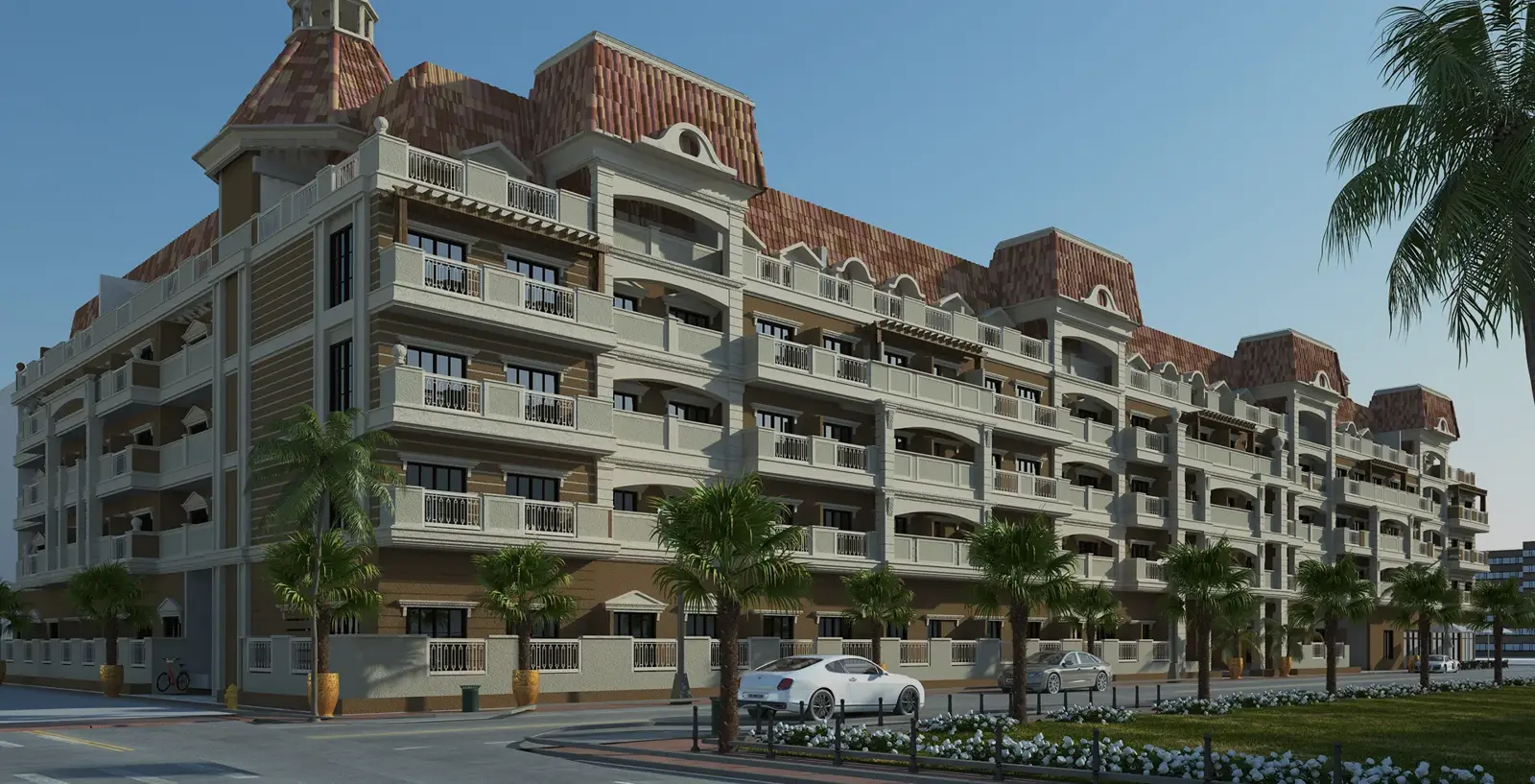 Corner view of the building with palms and car