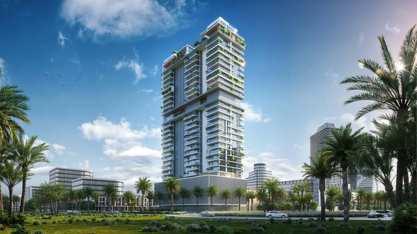 Tower seen across palms and lawn