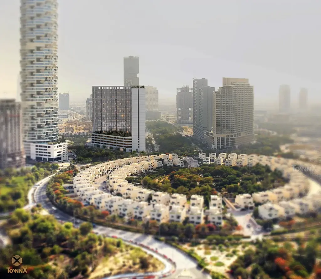 Tower among JVC buildings and circular villas