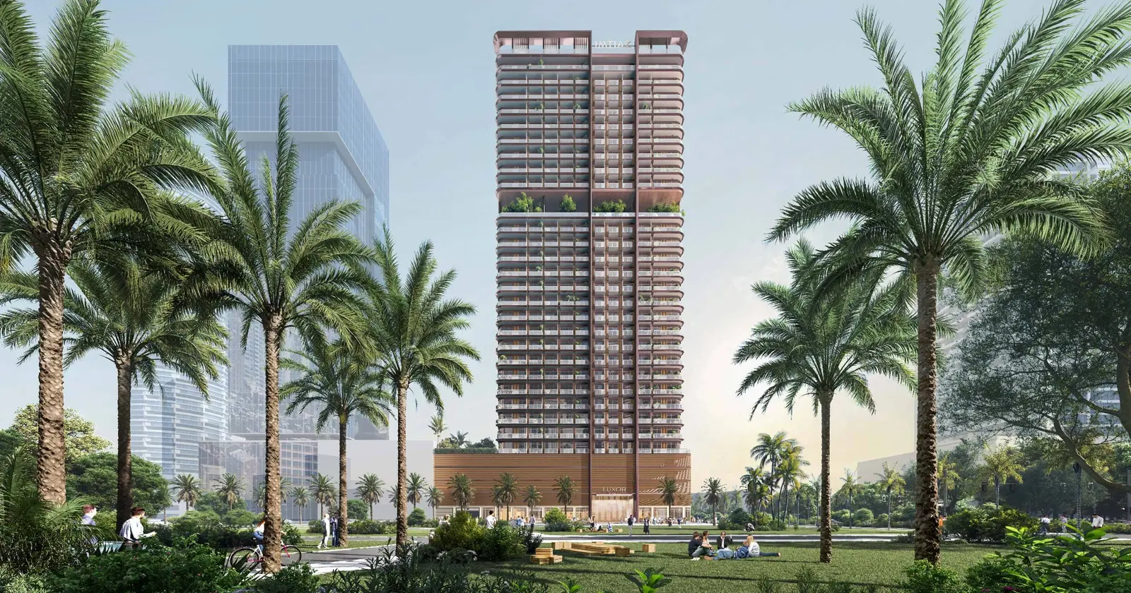 Tower seen across a palm-lined park
