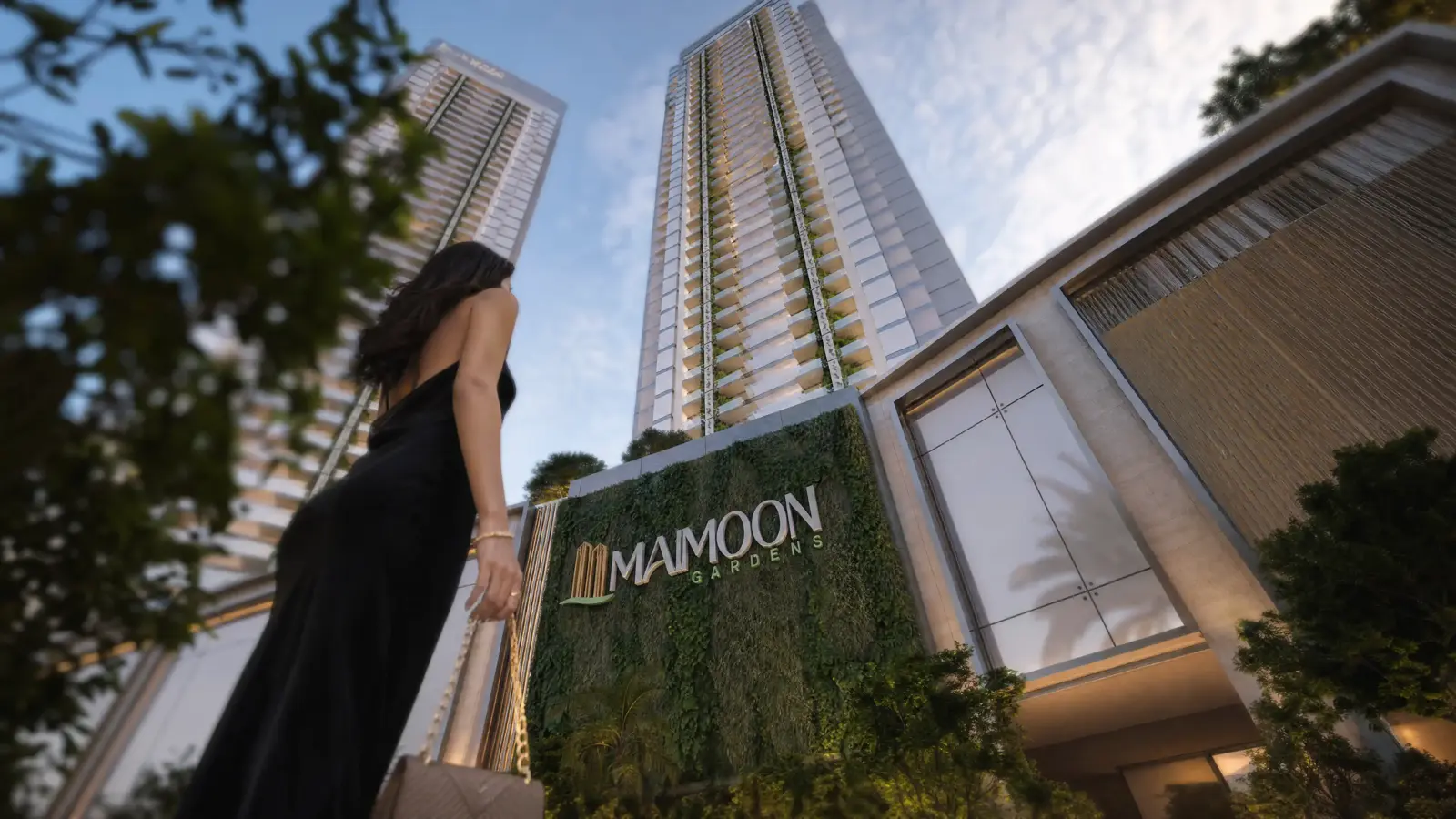 Tower entrance with green wall and logo