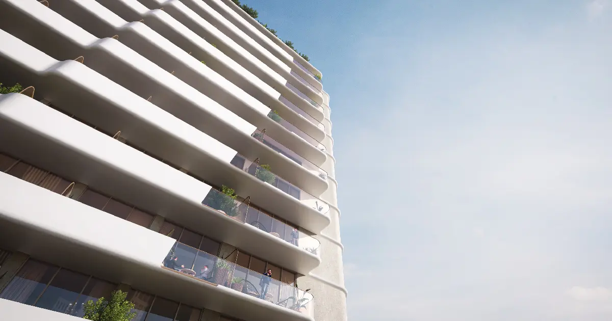 Curved white balconies seen from below