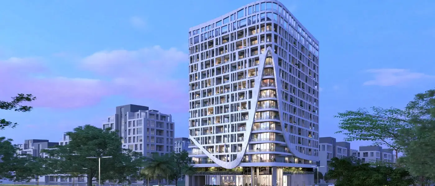 Tower facade at dusk with curved arch