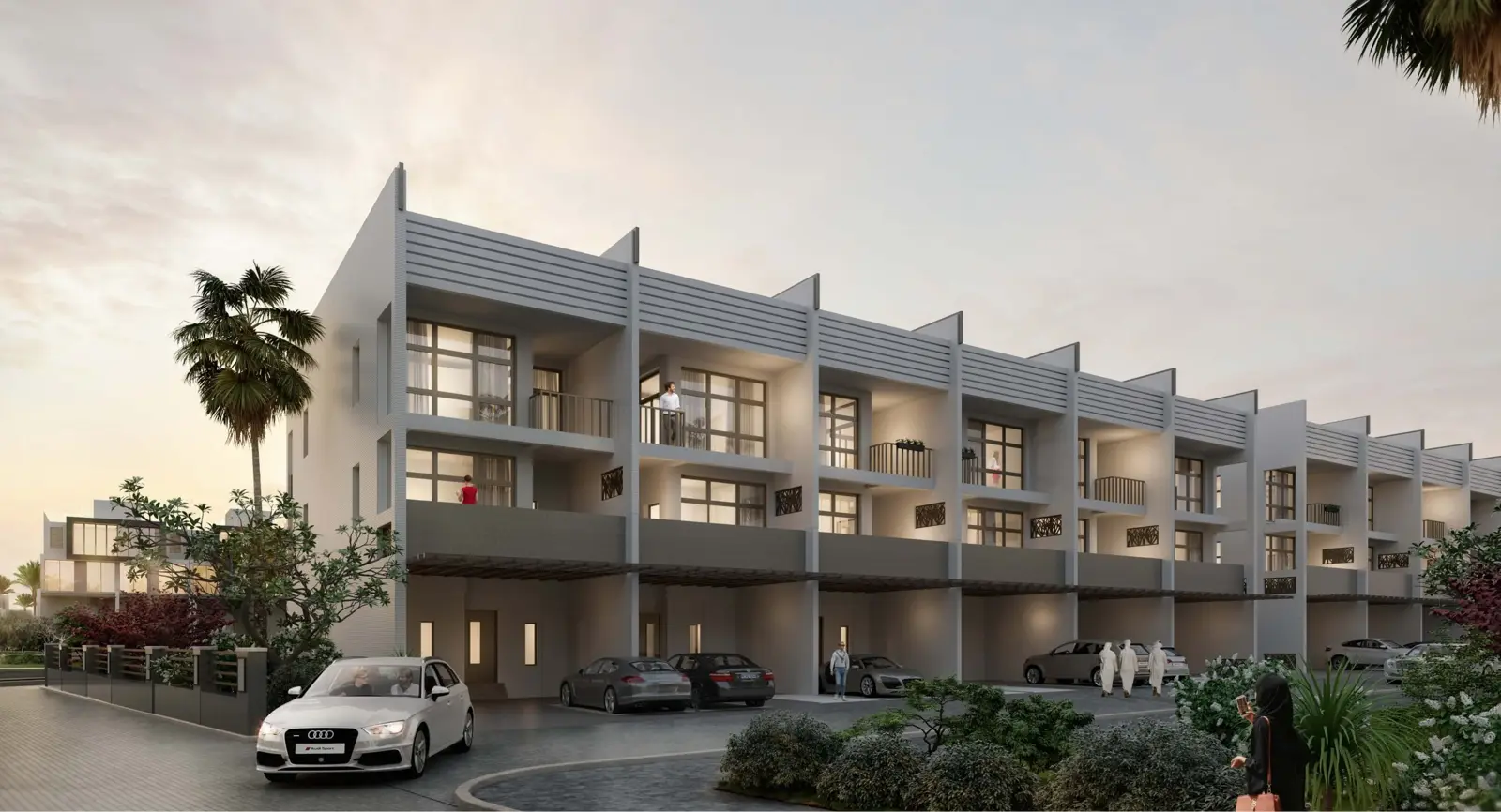 Townhouse block with carport at sunset