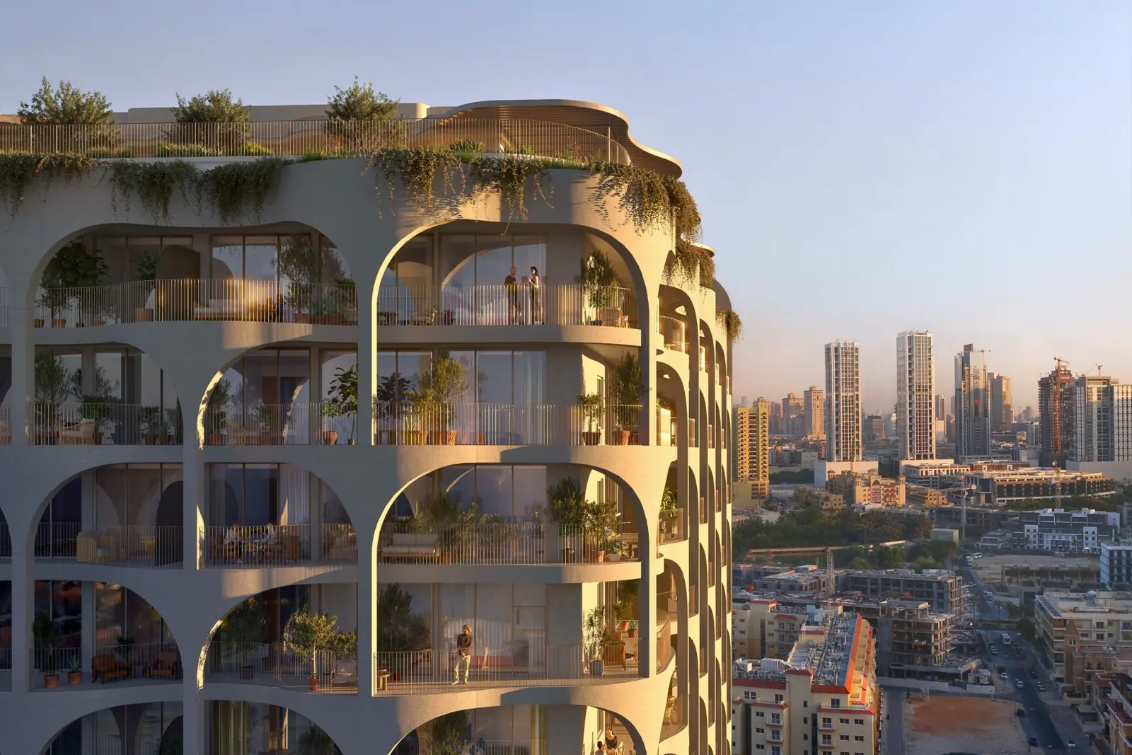 Arched balconies with greenery at sunset
