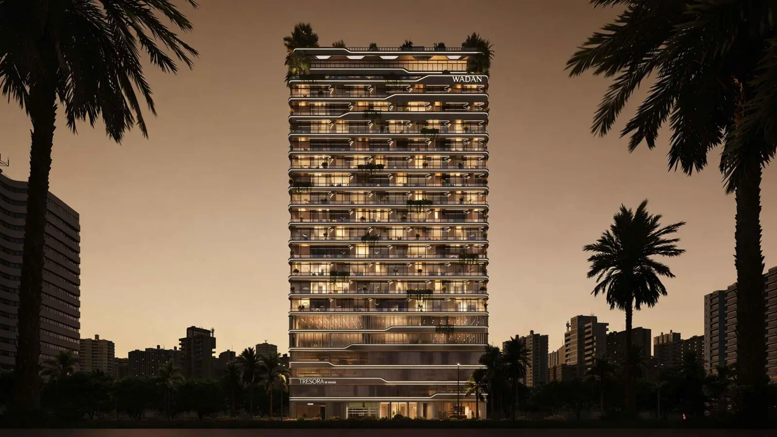 Full tower at dusk framed by palm trees