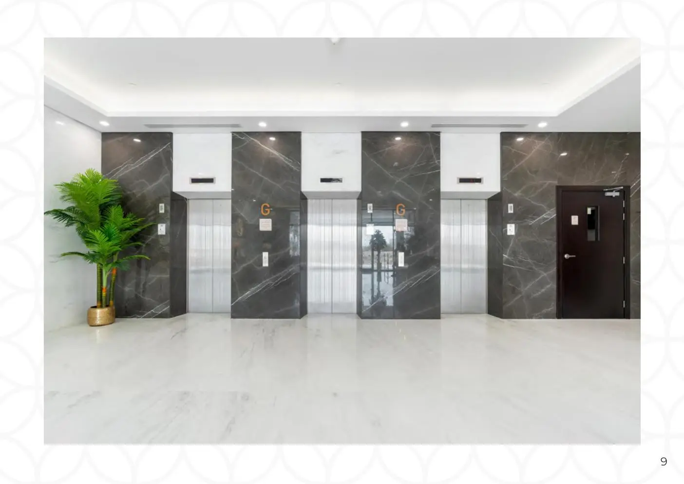 Elevator lobby with marble walls