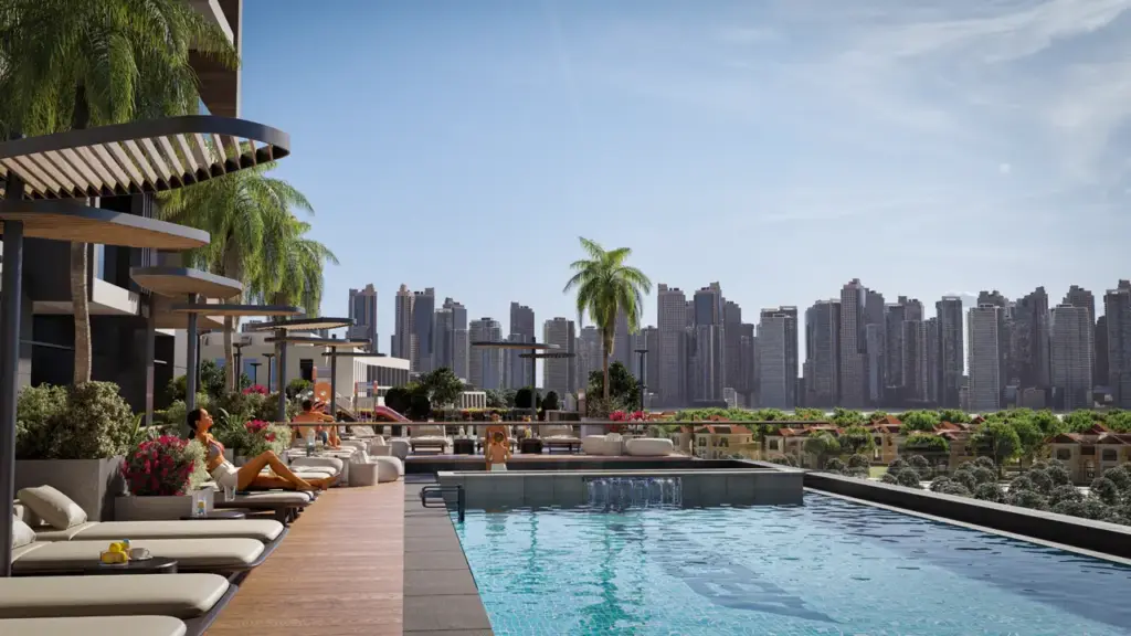 Pool deck with loungers and skyline view