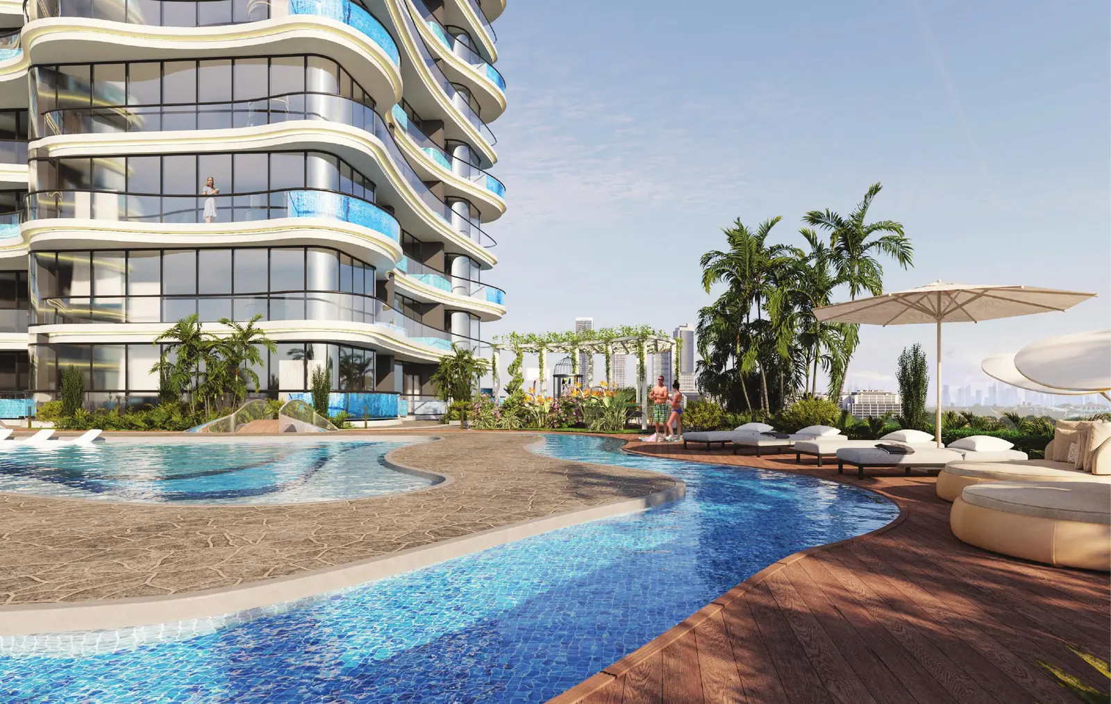 Pool deck with palms beside curved balconies