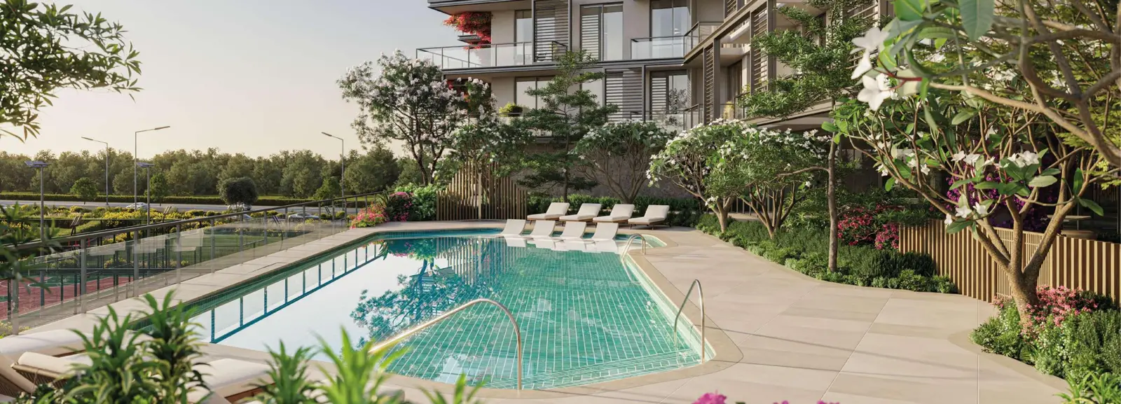 Swimming pool with loungers and landscaping