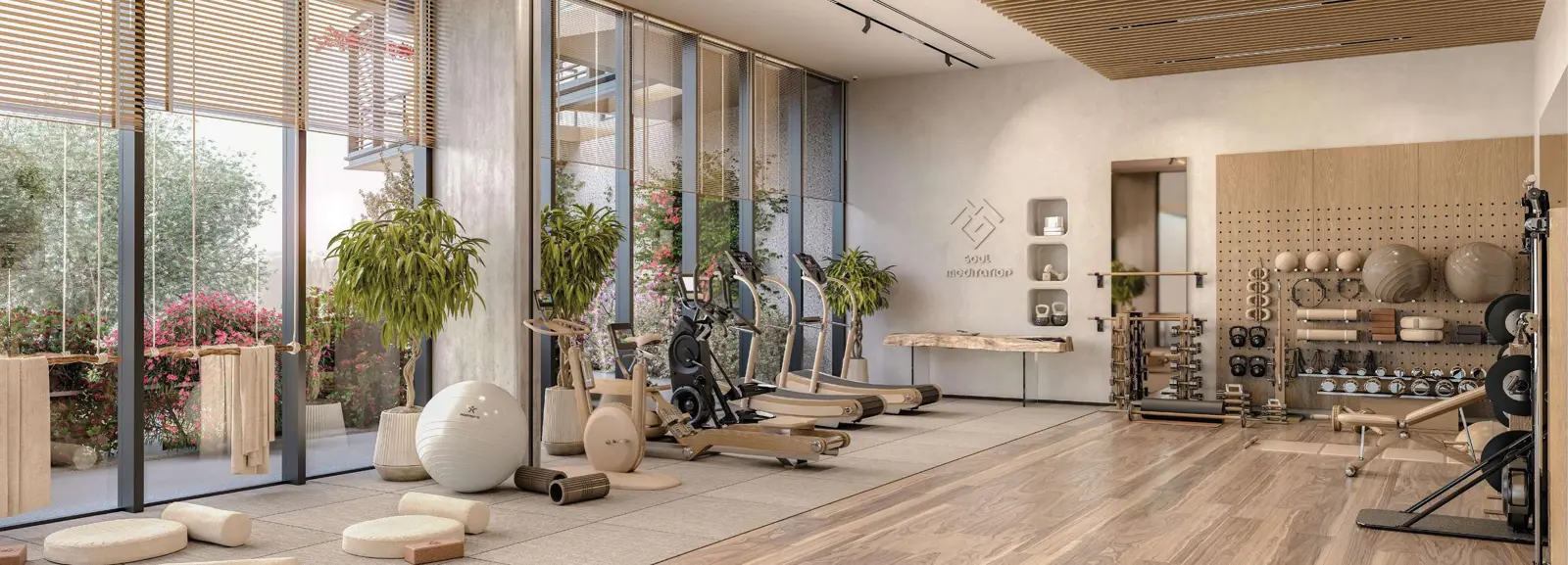 Indoor gym with garden-facing glass wall