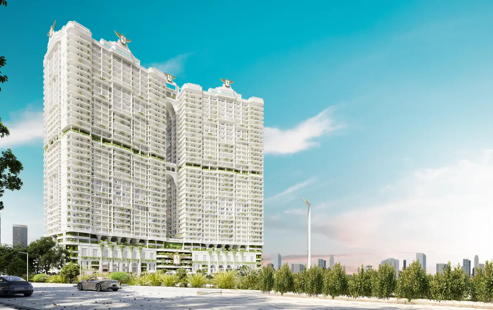 White twin-tower facade with green terraces