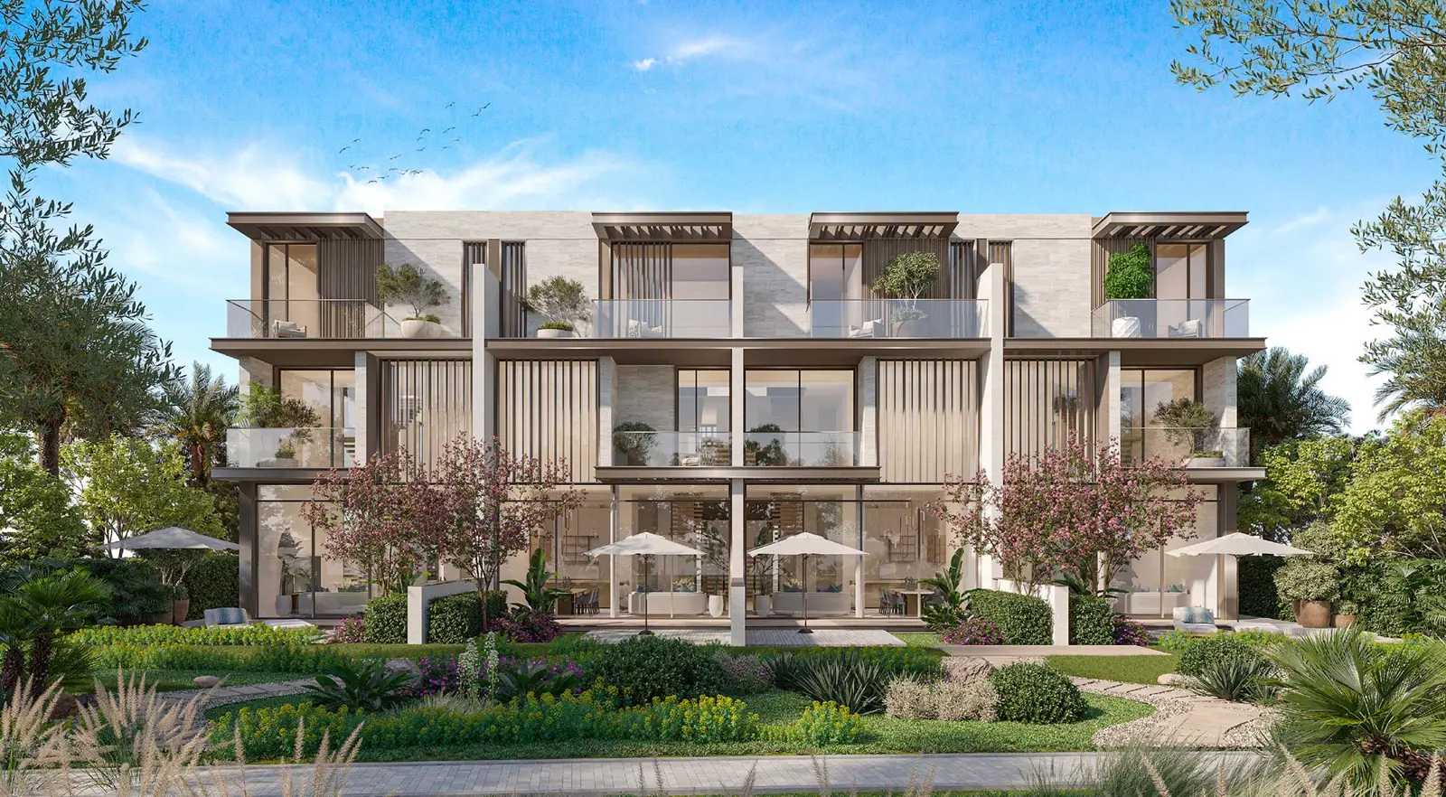 Townhouse facade with balconies and gardens