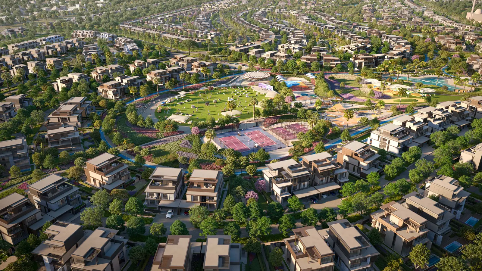 Aerial view of park with tennis courts and lawn