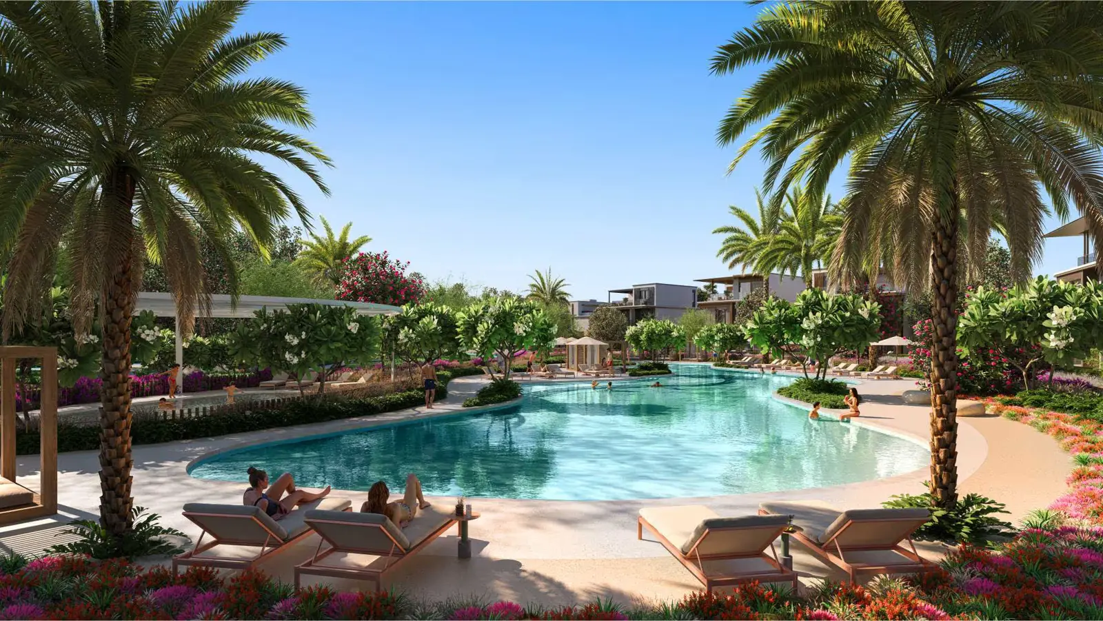 Lagoon pool with palms and sun loungers