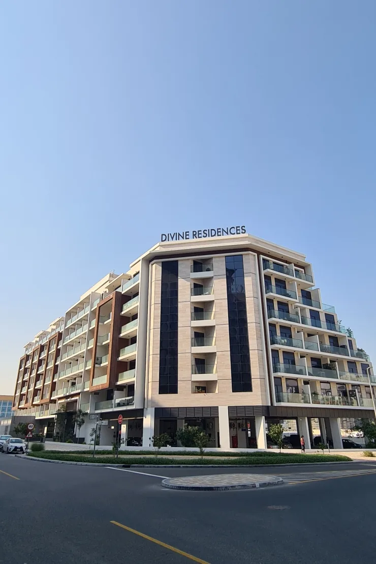 Front exterior with Divine Residences sign (740x1110)