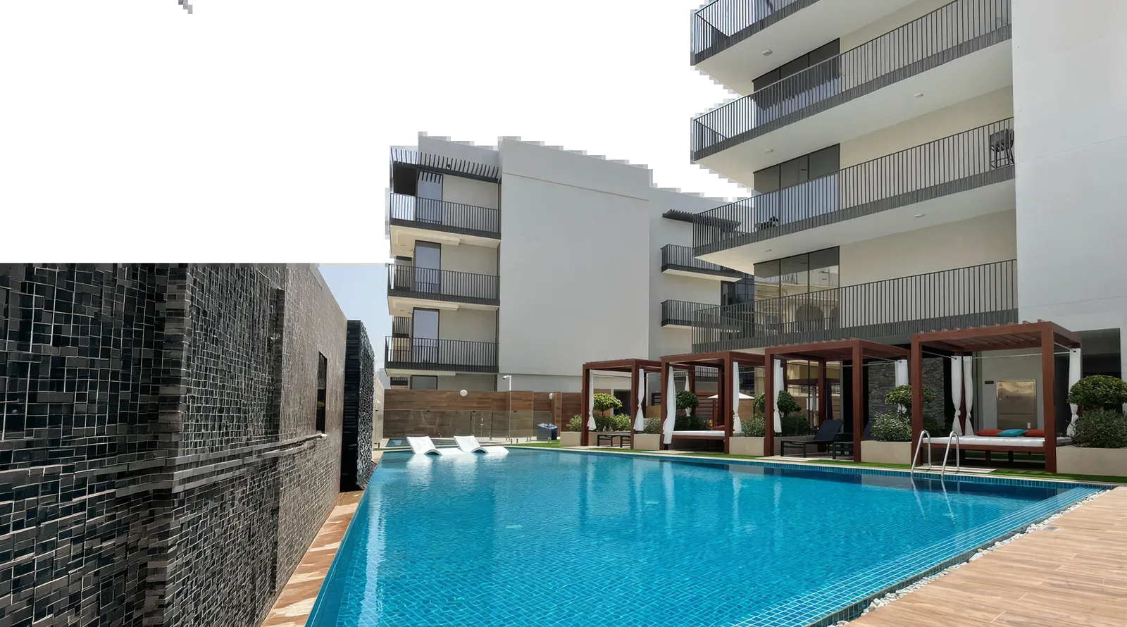 outside and pool deck of the project, wider view (top-left corner of the image is blank)