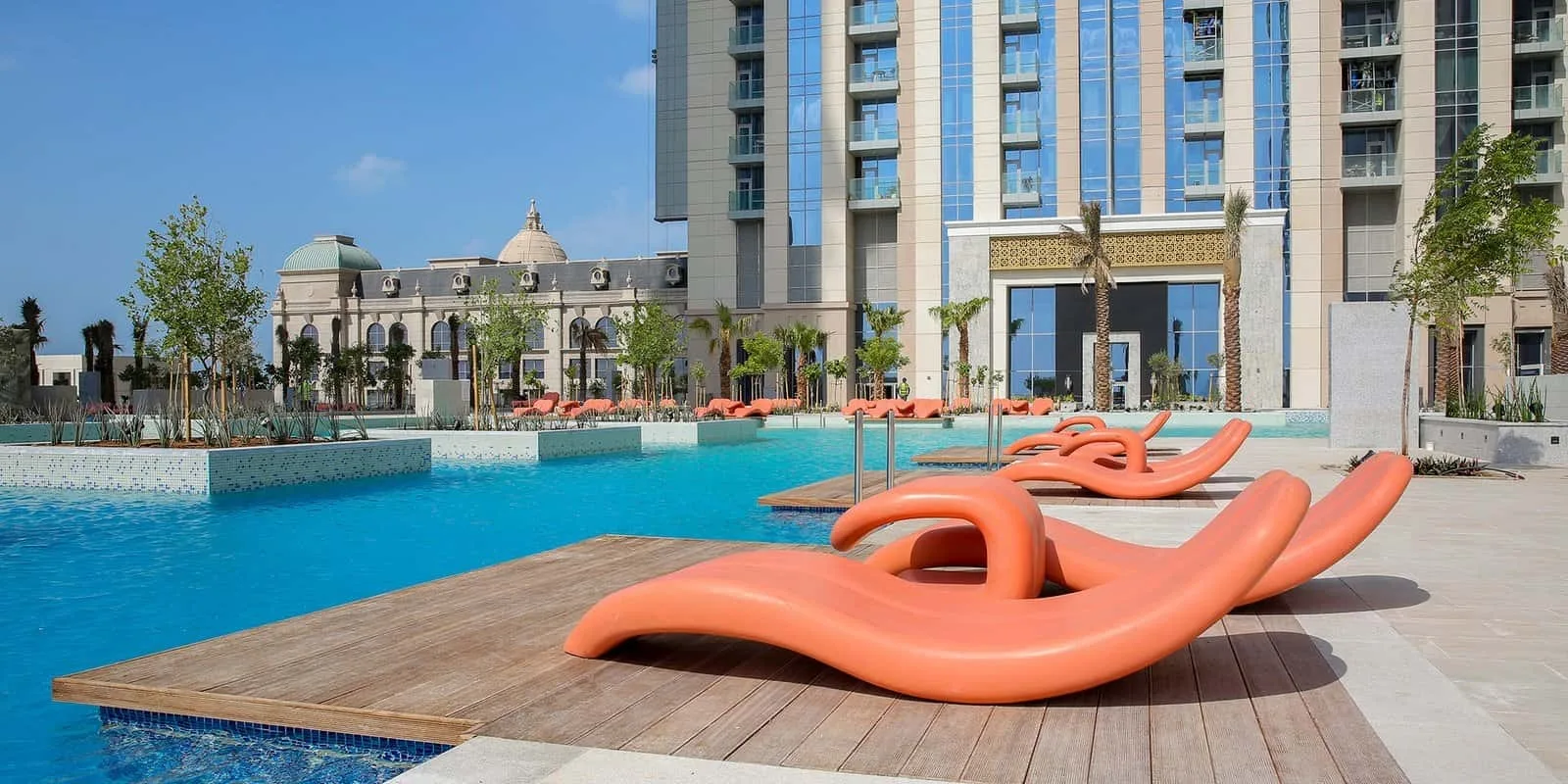 Pool deck with tower entrance and domed neighbour