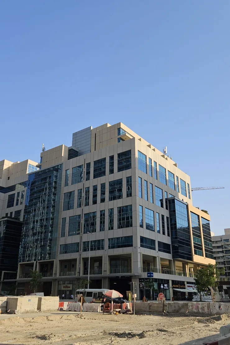 Corner view of completed building, ground to roof