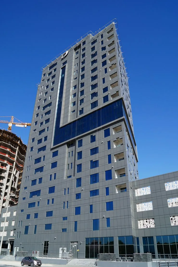 Tower A full height with blue glazed band and crown