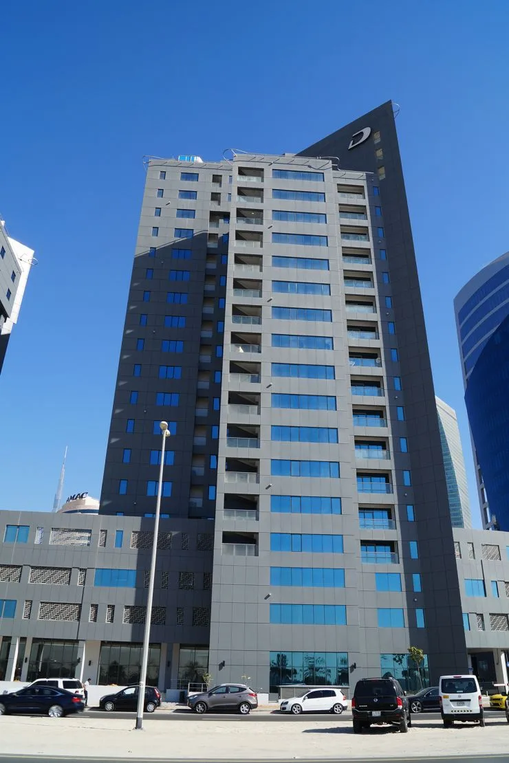Tower A full height with angled crown and podium