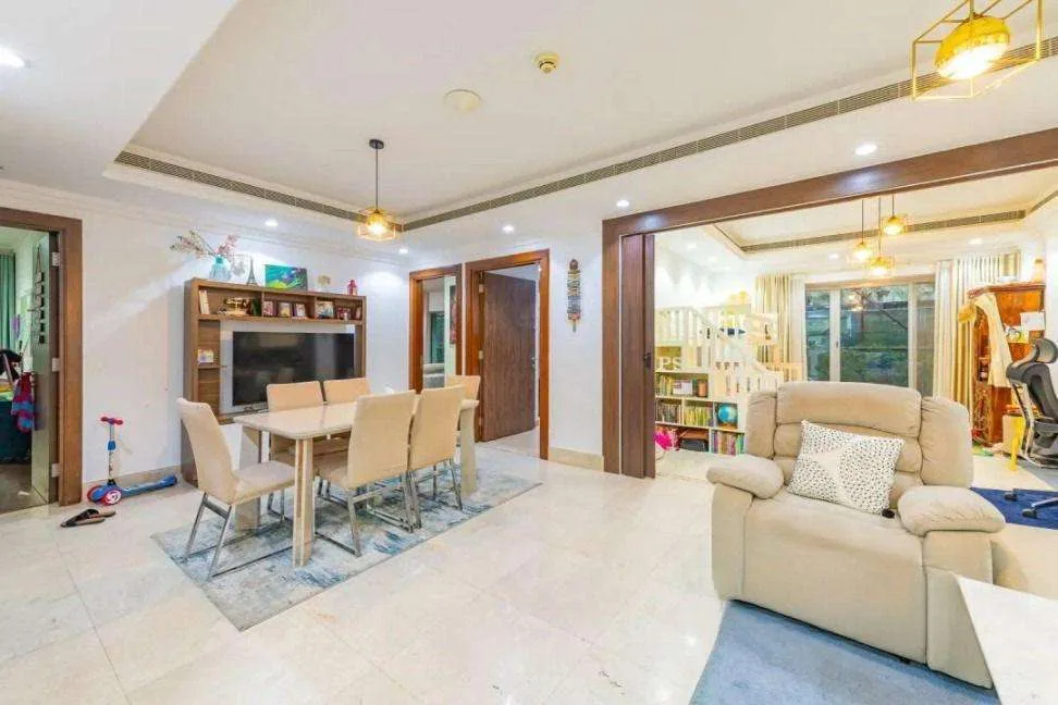 Living and dining area of a Plaza Boutique 15 unit
