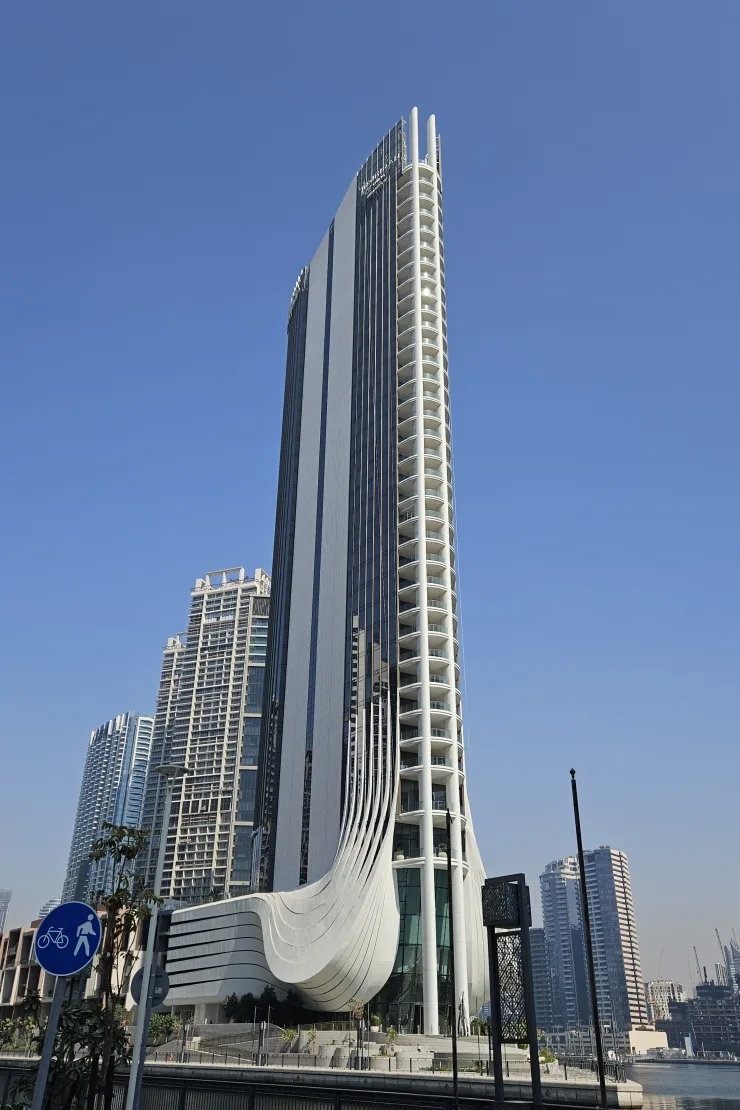 Full tower with white wave podium, from the waterfront