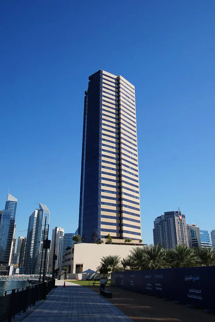 Tower and podium seen from the waterfront promenade