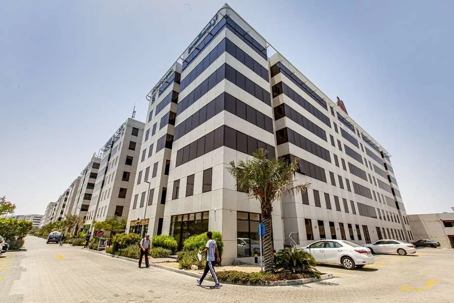 Corner view of striped Arenco office building