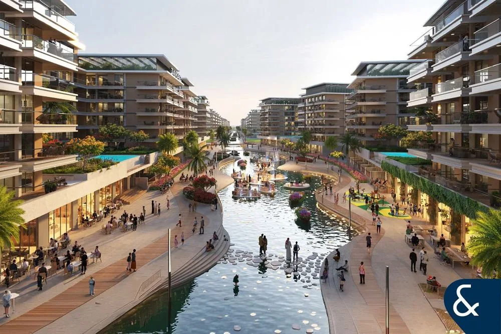 Canal promenade lined by terraced residential blocks