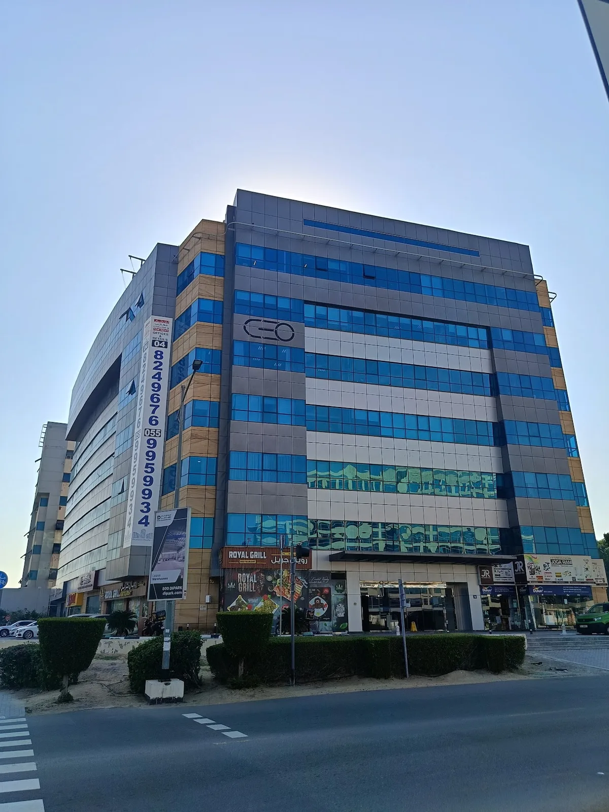 CEO Building full facade with logo, street view