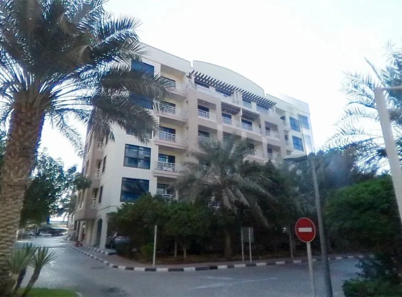 Building 7 from the corner, with curved crown and pergola
