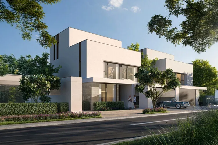 Modern white townhouse exterior with garage and street