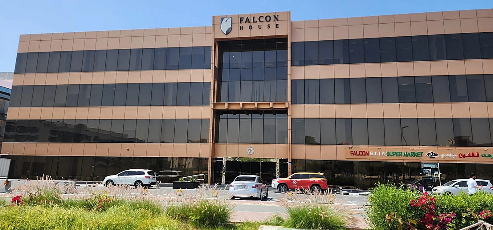 Front facade of Falcon House, full height, clear sky