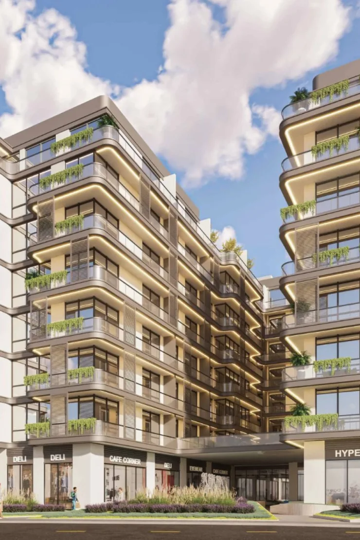 Street-facing facade with curved balconies and retail podium