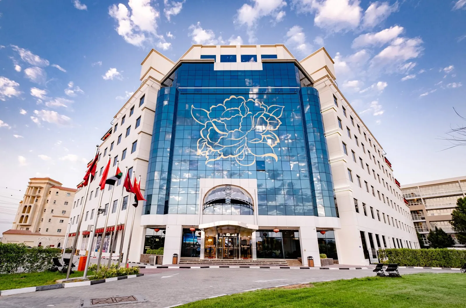 Blue glass peony facade, full building, daytime